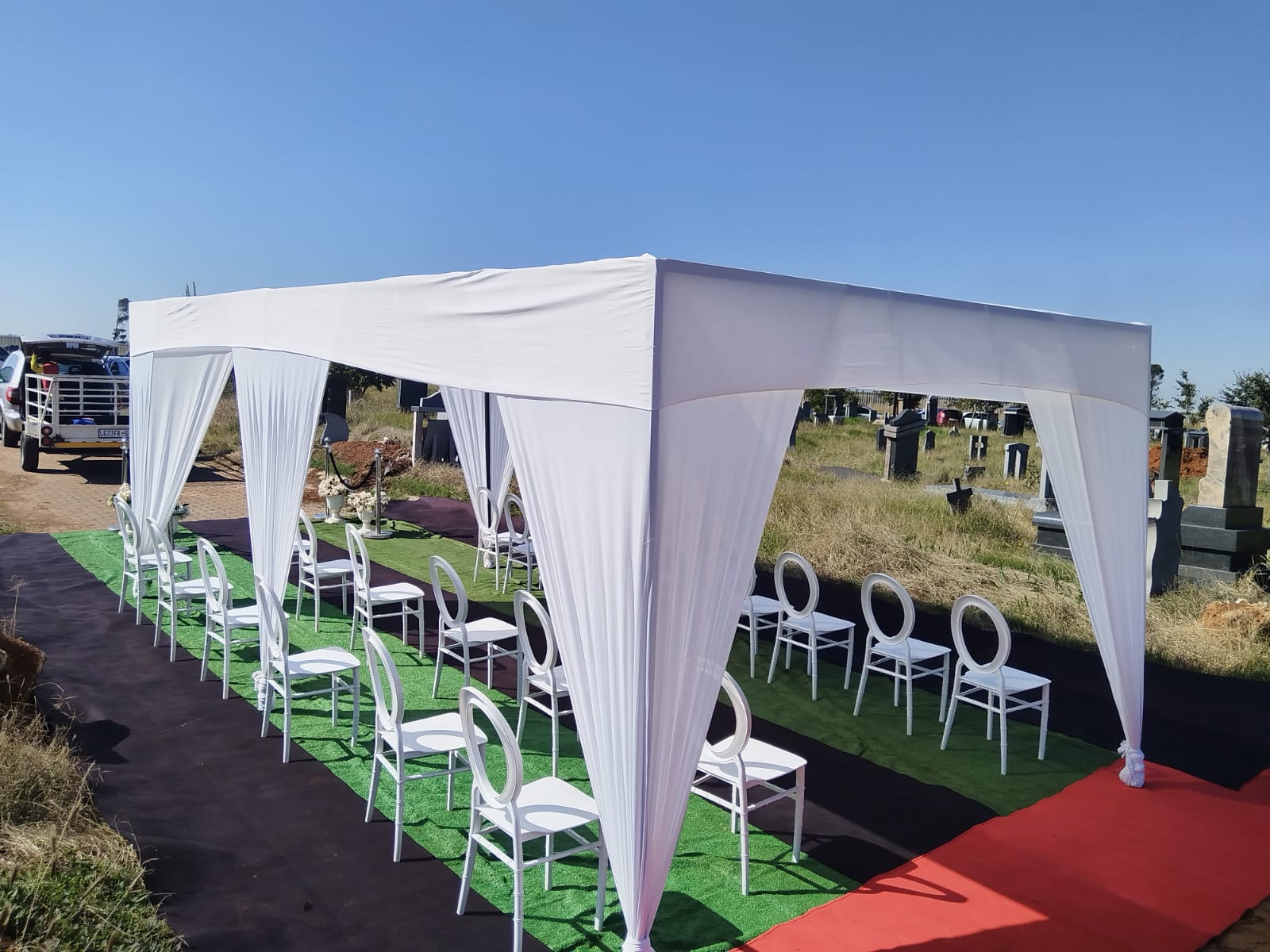 Pristine white tents and chairs